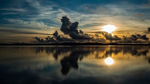 Sunrise in Palau calm water clouds time-lapse