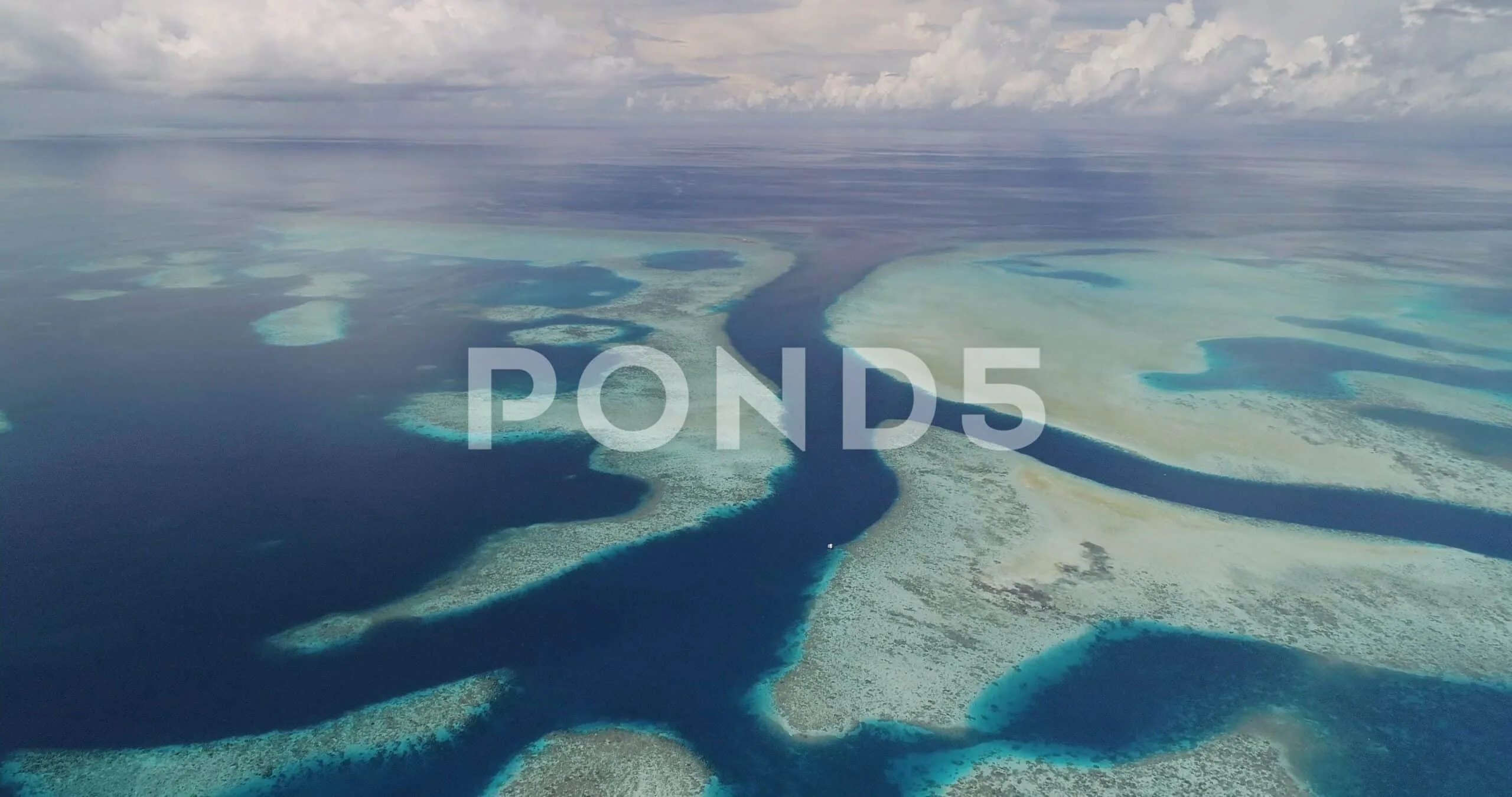 Aerial shot of reef system and tidal channel